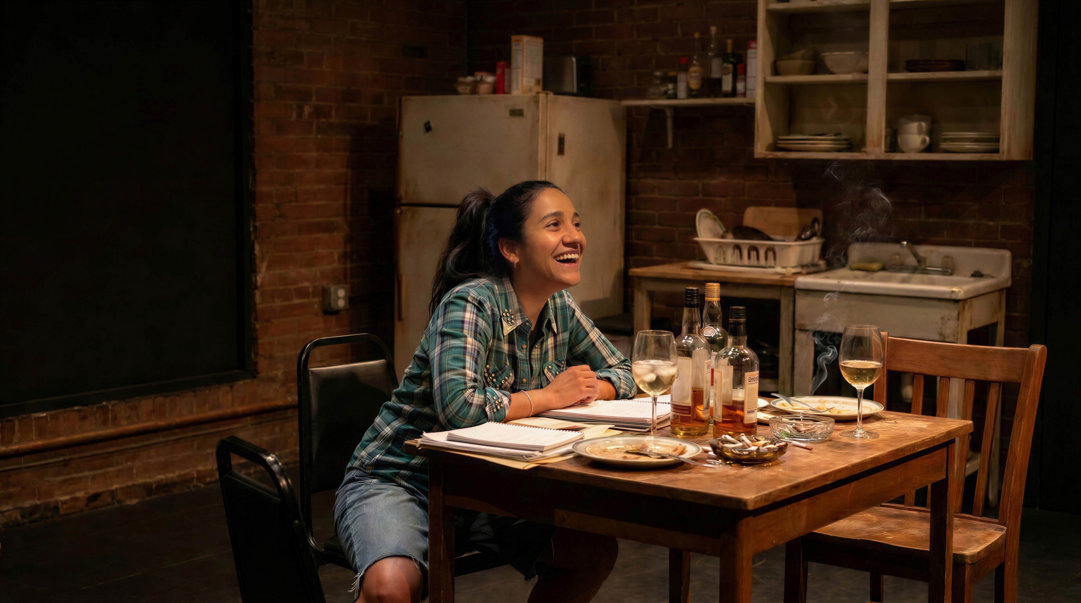 Priya Karki as Ella and her playwright father, David, sharing a moment in Ella's apartment during a scene from five years earlier in the play 8th Day Whisper