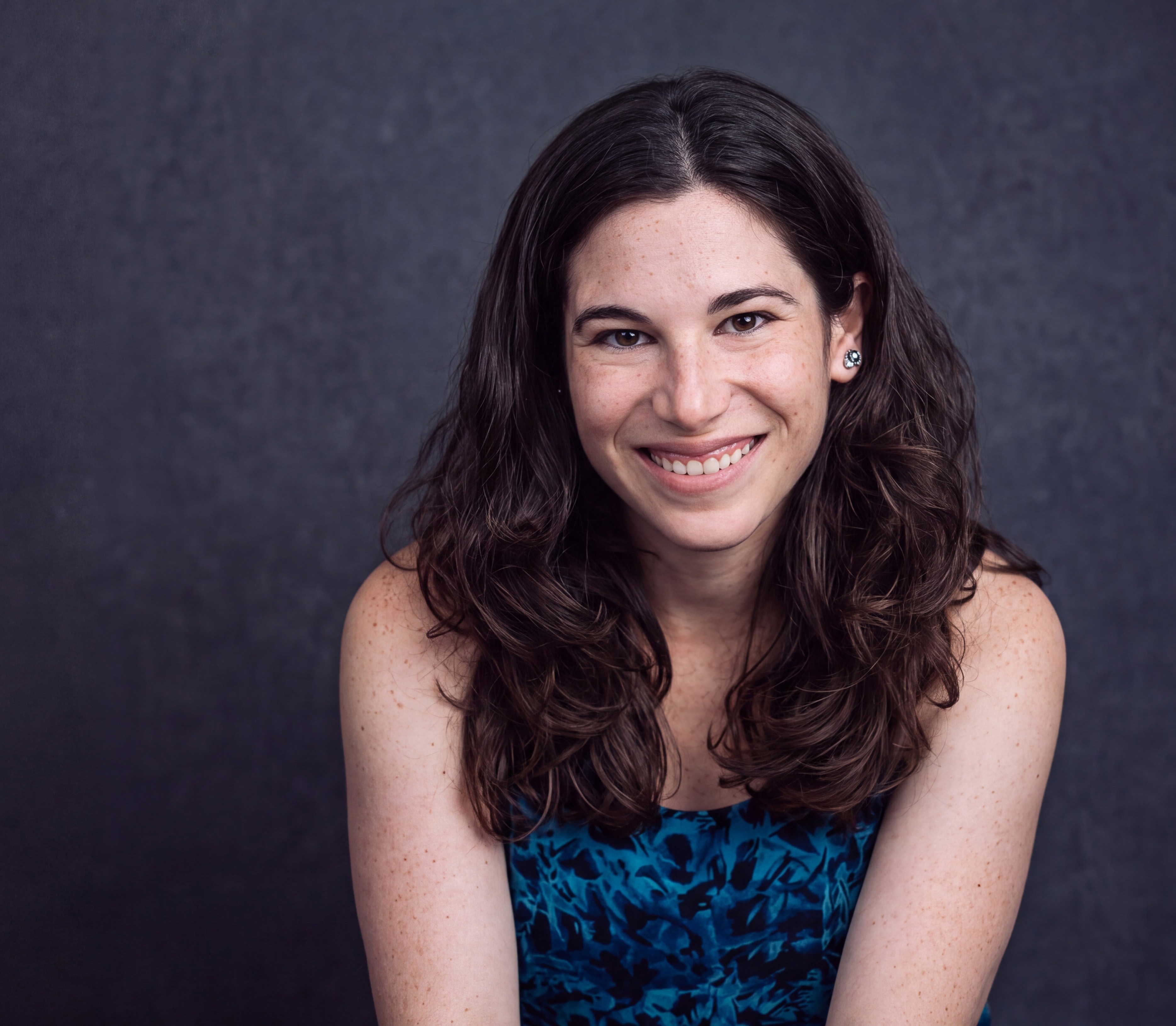 Portrait of director Chrissy Sheehan looking toward the camera.